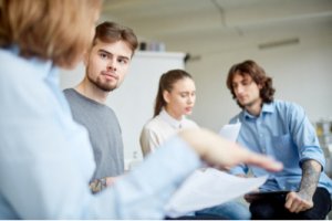 woman going over insurance with man