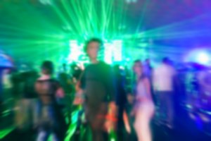 person in club with blurred vision from overdose of mdma